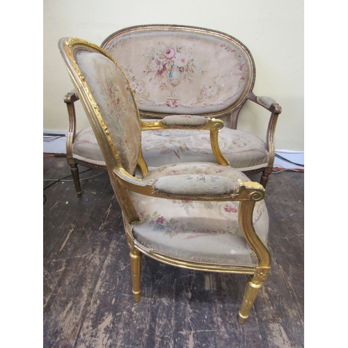 1559 - A 19th century three piece salon suite comprising a two seat sofa with oval cameo shaped back and wi... 