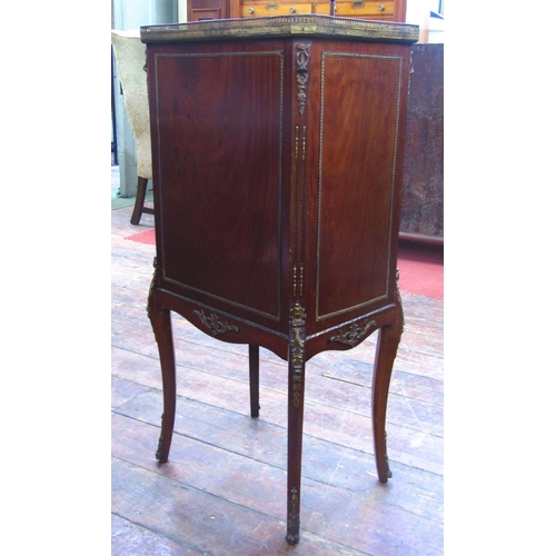 1560 - A late 19th century French folio/sheet music cabinet,the front elevation enclosed by a panelled door... 