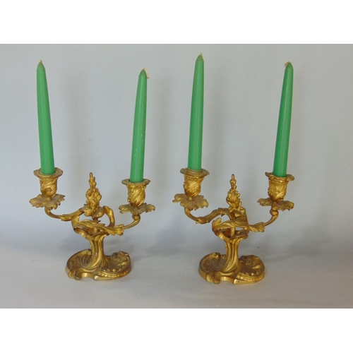 587 - Pair of French gilt cast metal,twin branch candelabra,17cm high (2)