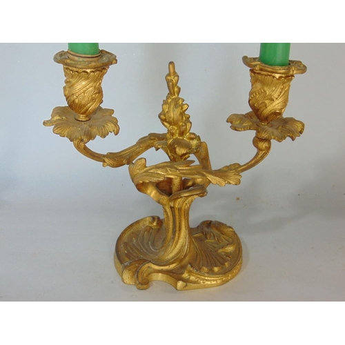 587 - Pair of French gilt cast metal,twin branch candelabra,17cm high (2)