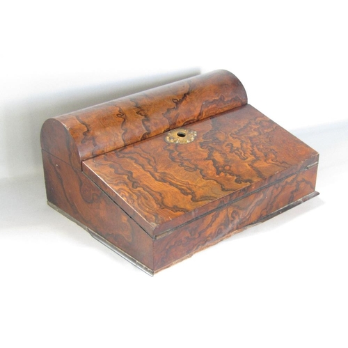 590 - A good quality burr walnut writing slope,with domed hinged top enclosing two ceramic inkwells and fu... 