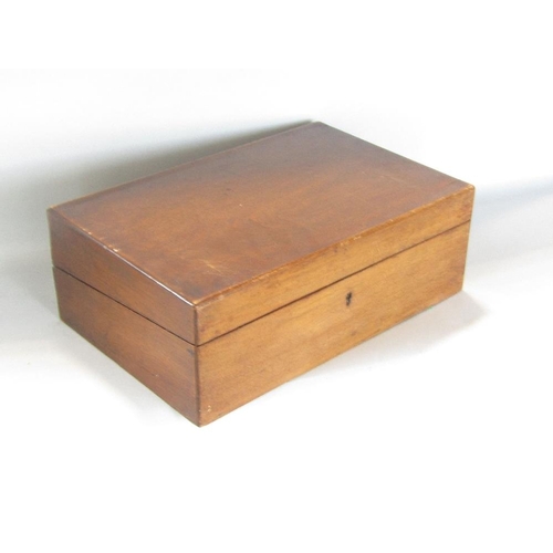 590 - A good quality burr walnut writing slope,with domed hinged top enclosing two ceramic inkwells and fu... 