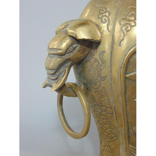 591A - A good quality Chinese polished cast bronze,baluster twin handled vase,with twin elephant ring handl... 