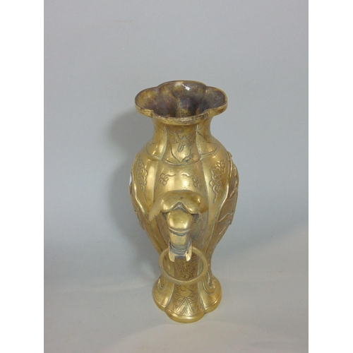 591A - A good quality Chinese polished cast bronze,baluster twin handled vase,with twin elephant ring handl... 