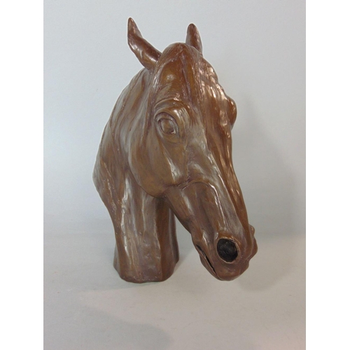 598 - Bronzed resin bust of a horses head,22cm high marked Kerek 80