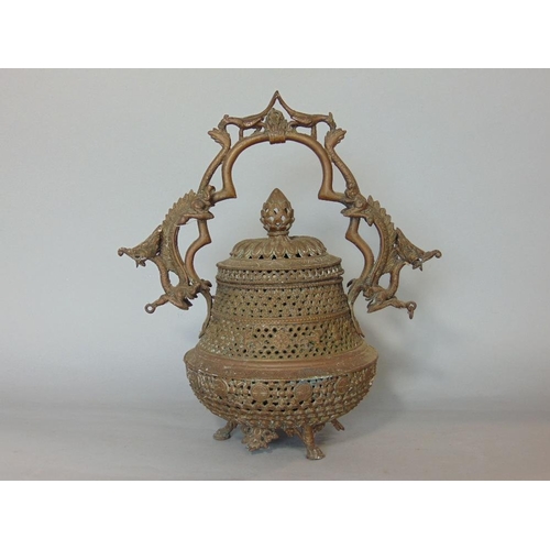 600 - Good quality Chinese pierced bronze baluster lidded cauldron,the hoop handle cast with dragons and b... 