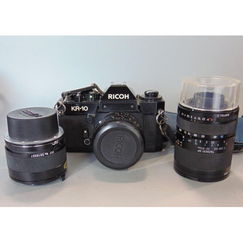 601 - Good quality cased Ricoh camera with various lens together with a collection of other cameras includ... 