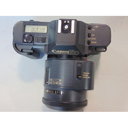 606 - A Canon EOS 50E camera together with a further Canon TAC camera with zoom lens (2)