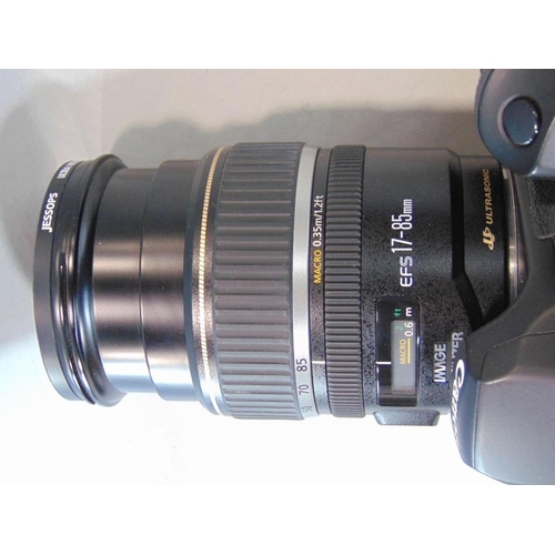 607 - A good quality Canon EOS 40D camera with further Canon EFS17-85mm lens and another Canon 75-300mm le... 