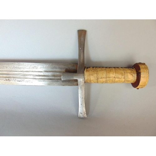 622 - A Sudanese broad sword,with embossed leather scabbard with white metal tip