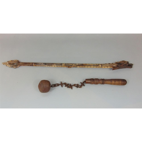 626A - Interesting long carved bone blow pipe in the form of a serpent,together with an antique style mace ... 