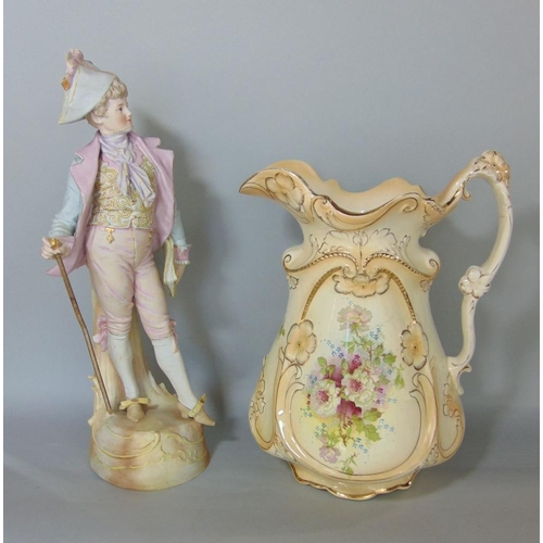 635 - An Edwardian jug and basin set with printed floral detail,19th century bisque figure of a Dandy,a ca... 