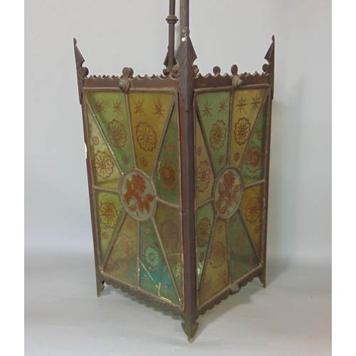 643 - A Victorian brass framed hall lantern of square cut form with original painted leaded light panels o... 