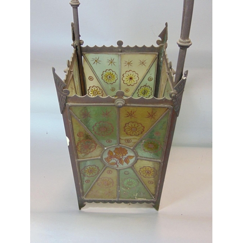 643 - A Victorian brass framed hall lantern of square cut form with original painted leaded light panels o... 