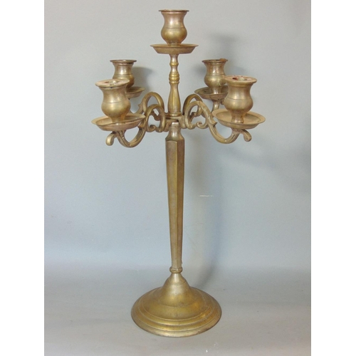 646 - A plated four branch candelabra on hexagonal tapering stem,with circular base