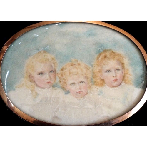 659 - Mabel Terry Lewis (British,active 1897-1925) a bust length portrait miniature of three young childre... 