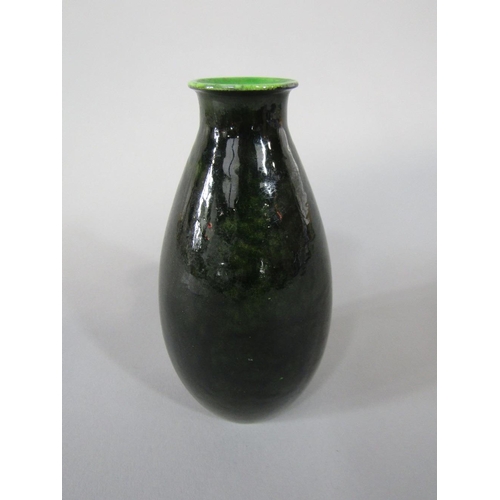 66 - A Doulton Lambeth faience vase with dark green Titanium glazed finish and with impressed mark to bas... 