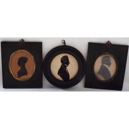 664 - A collection of three 19th century profile silhouette portrait miniatures. comprising a young lady w... 