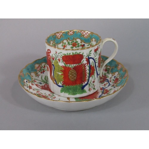 67 - An early 19th century Derby coffee can and saucer of fluted form with polychrome painted chinoiserie... 