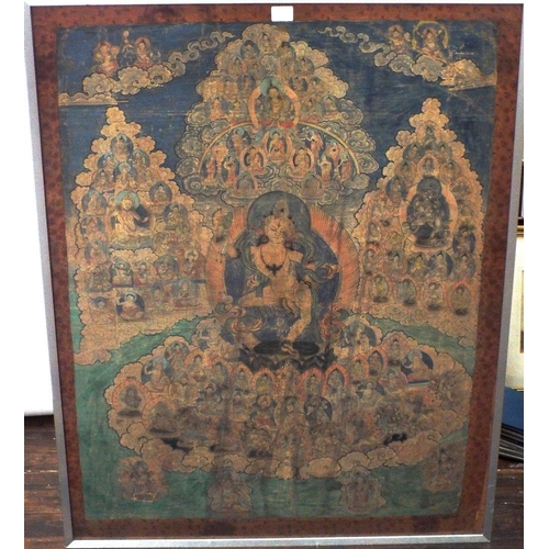 674 - An early 19th century Tibetan Thanka showing a central dancing deity surrounded by a host of further... 