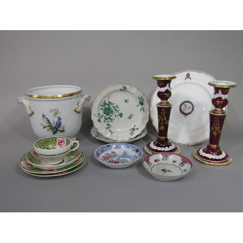 80 - A collection of early 19th century and later ceramics including a pair of dark red and gilt candlest... 