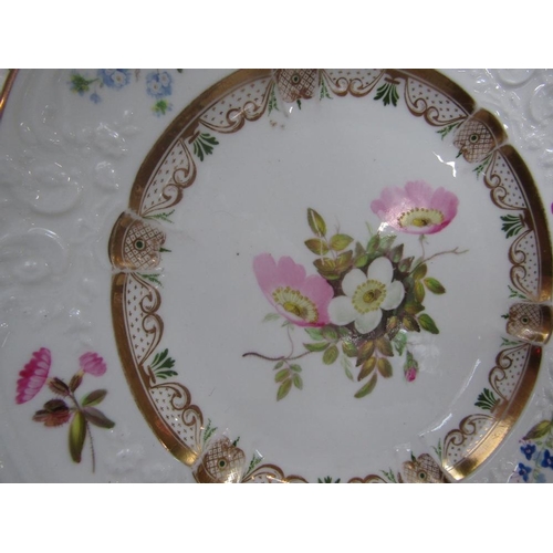 83 - A pair of early 19th century Nantgarw dessert plates,with relief moulded borders and painted floral ... 