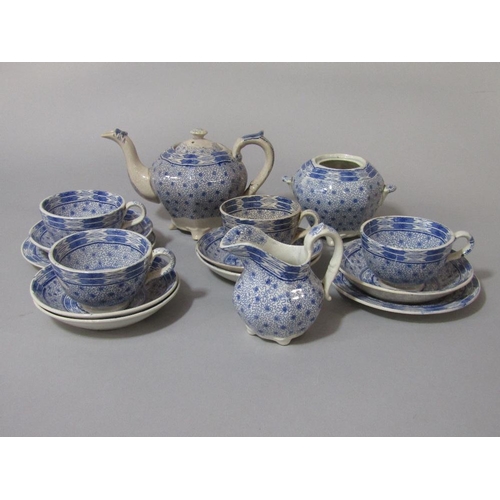 99 - A collection of 19th century blue and white printed child~s miniature teawares comprising teapot,mil... 