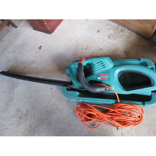 146 - A Bosch AHS650 24ST electric hedge trimmer and case, little used