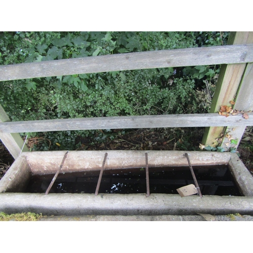 69 - A weathered reconstituted feeding trough, 170cm x 45cm