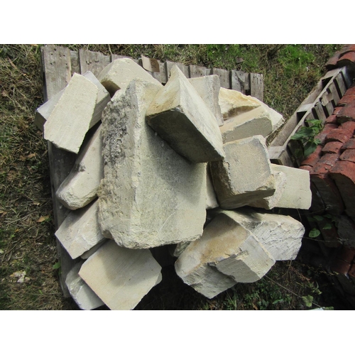 75 - A quantity of cut limestone quoins and lintels