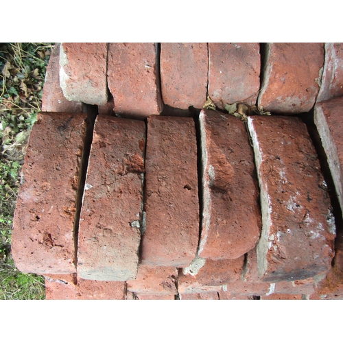 77 - Approx 250 Victorian brick wall toppers of arched form, 36cm long x 12cm high x 11cm deep