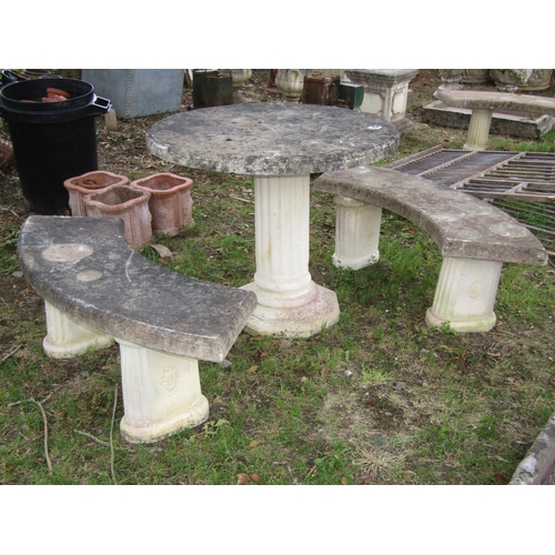 115 - A weathered reconstituted garden table, the circular top raised on a fluted column, with two crescen... 