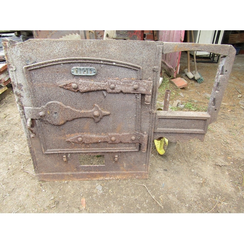 415 - 19th century cast iron oven front, pair of galvanised iron trumpet shaped speaker horns and an iron ... 