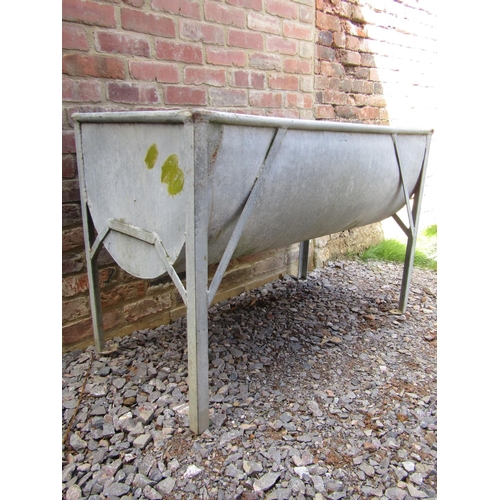 176 - A vintage galvanised iron D shaped water trough on raised supports, 125cm max