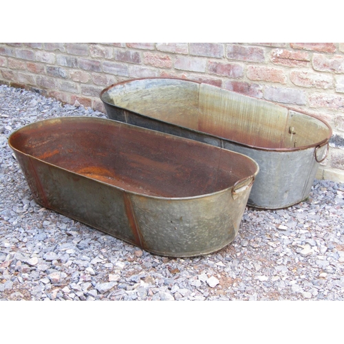 180 - A pair of vintage iron baths, 120cm long