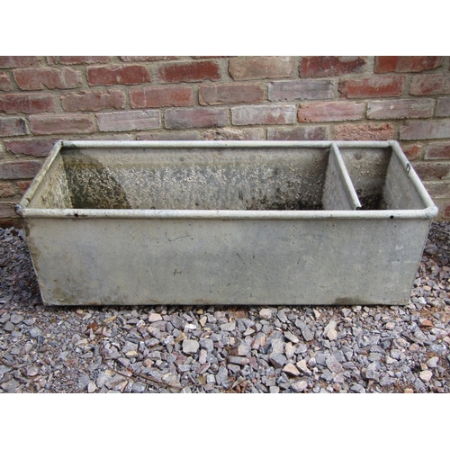 182 - A vintage glavanised iron water rough, 122cm long