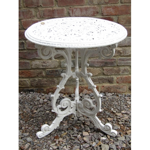 188 - A decorative cast aluminium terrace table with pierced top, raised on three scrolling supports