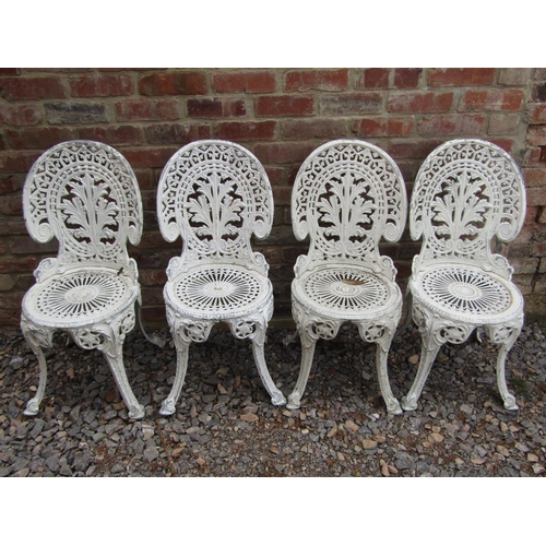 190 - A set of four cast aluminium terrace chairs with anthemion and other detail