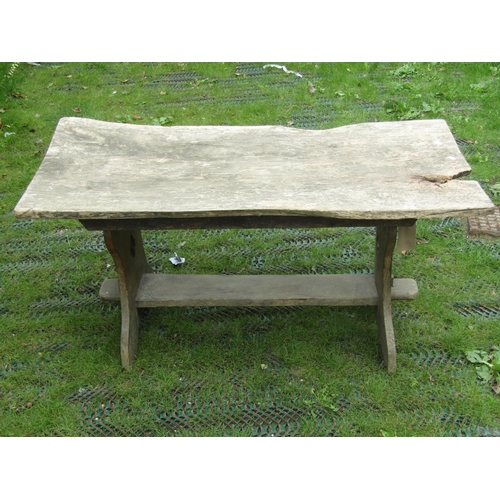 204 - A small rustic elm occasional table with shaped supports and quafoil pierced detail, 120cm long