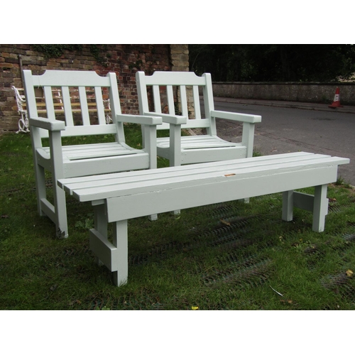 205 - A pair of painted garden armchairs with matching low level occasional table, 150cm long