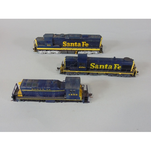 188 - Box of mixed HO locomotives, unboxed, some repainted together with a Walthers diesel locomotive 4616... 