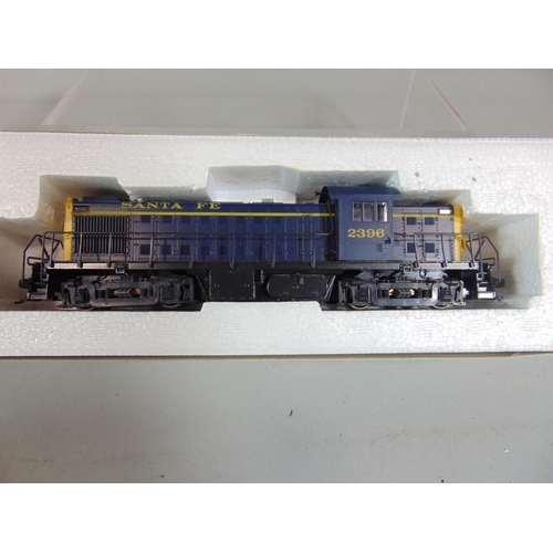 199 - 4 HO gauge locomotives including Sant Fe nos 2158, 2396 and 2683, two boxed, two unboxed (4)