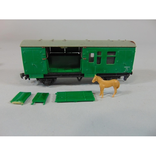 135 - Quantity of Hornby Dublo wagons including 3 breakdown packing vans, a Midland Rail horsebox, and a S... 