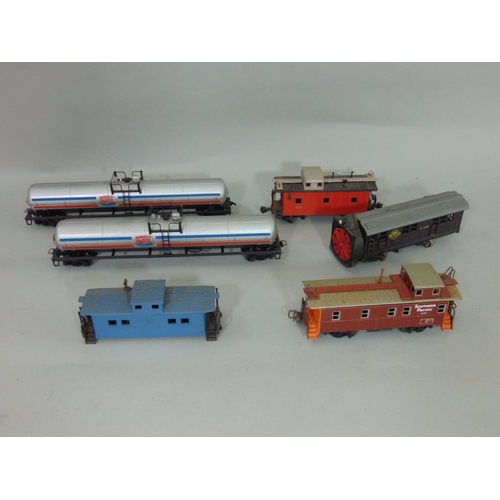 205 - Large collection  of unbranded North American style HO gauge locomotives coaches, box cars, wagons, ... 