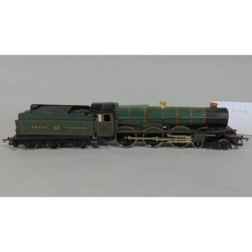 236 - Mixed unsorted collection of unboxed 00 gauge locomotives, rolling stock and model buildings  by Hor... 