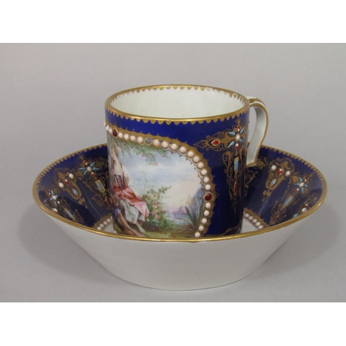 684 - An 18th century Sevres blue ground cabinet cup and saucer with central Watteauesque style painted pa... 