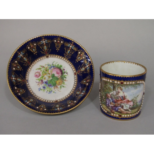 684 - An 18th century Sevres blue ground cabinet cup and saucer with central Watteauesque style painted pa... 