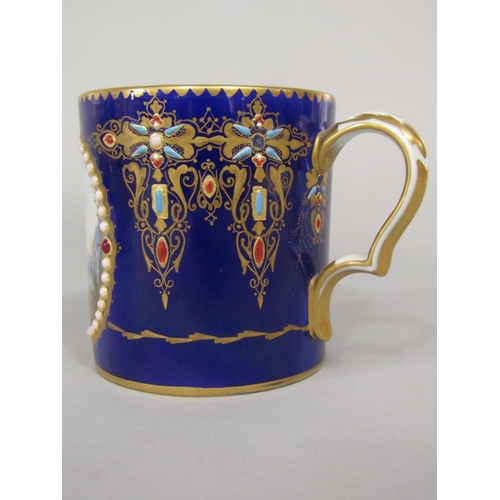 684 - An 18th century Sevres blue ground cabinet cup and saucer with central Watteauesque style painted pa... 