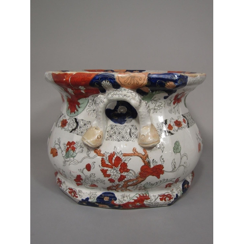 694 - A 19th century two handled foot bath with printed and infilled chinoiserie decoration and fish mould... 