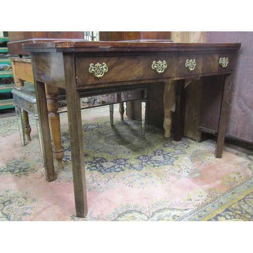 2200C - A Georgian style mahogany side table  the serpentine front fitted with two frieze drawers raised on ... 